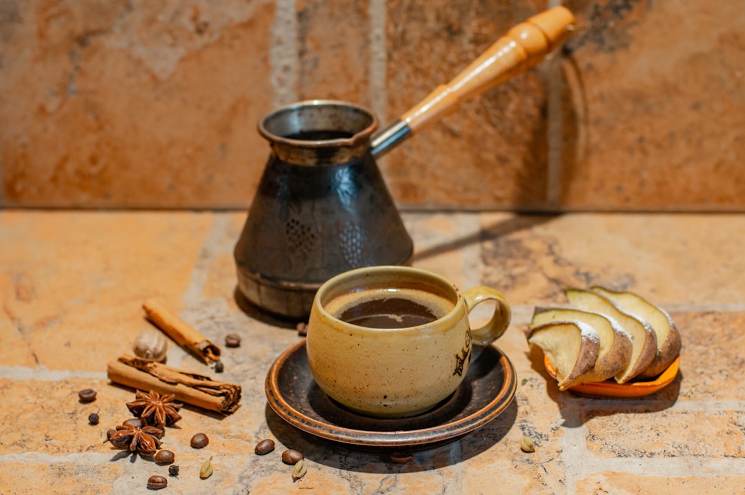 a-cup-of-coffee-and-a-spoon-isjsr5xb3pa